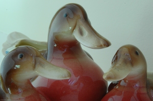 A Ceramic Mother Mallard Duck with a Duckling on Each Side